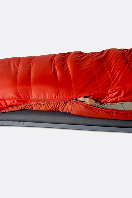 Rab Alpine Down Sleeping Bag (-6°C/21F) in Dark Horizon/Tuscan Red - worn