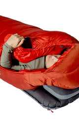 Rab Alpine Down Sleeping Bag (-18°C/0F) in Dark Horizon/Tuscan Red - Model Wrapped, Full Body on Mat