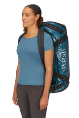 Rab Expedition II 80L Kitbag in Blue - Model Wearing as Backpack Front View