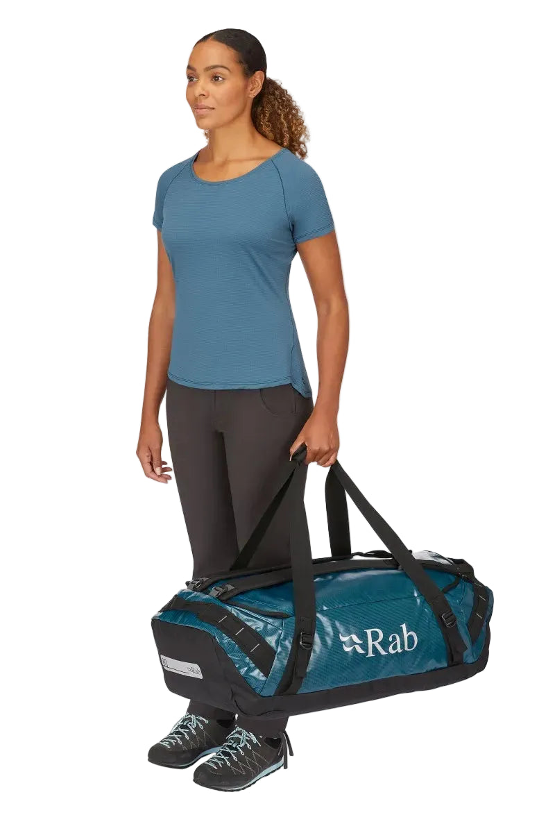 Rab Expedition II 80L Kitbag in Blue - Model Carrying as Duffel Side View