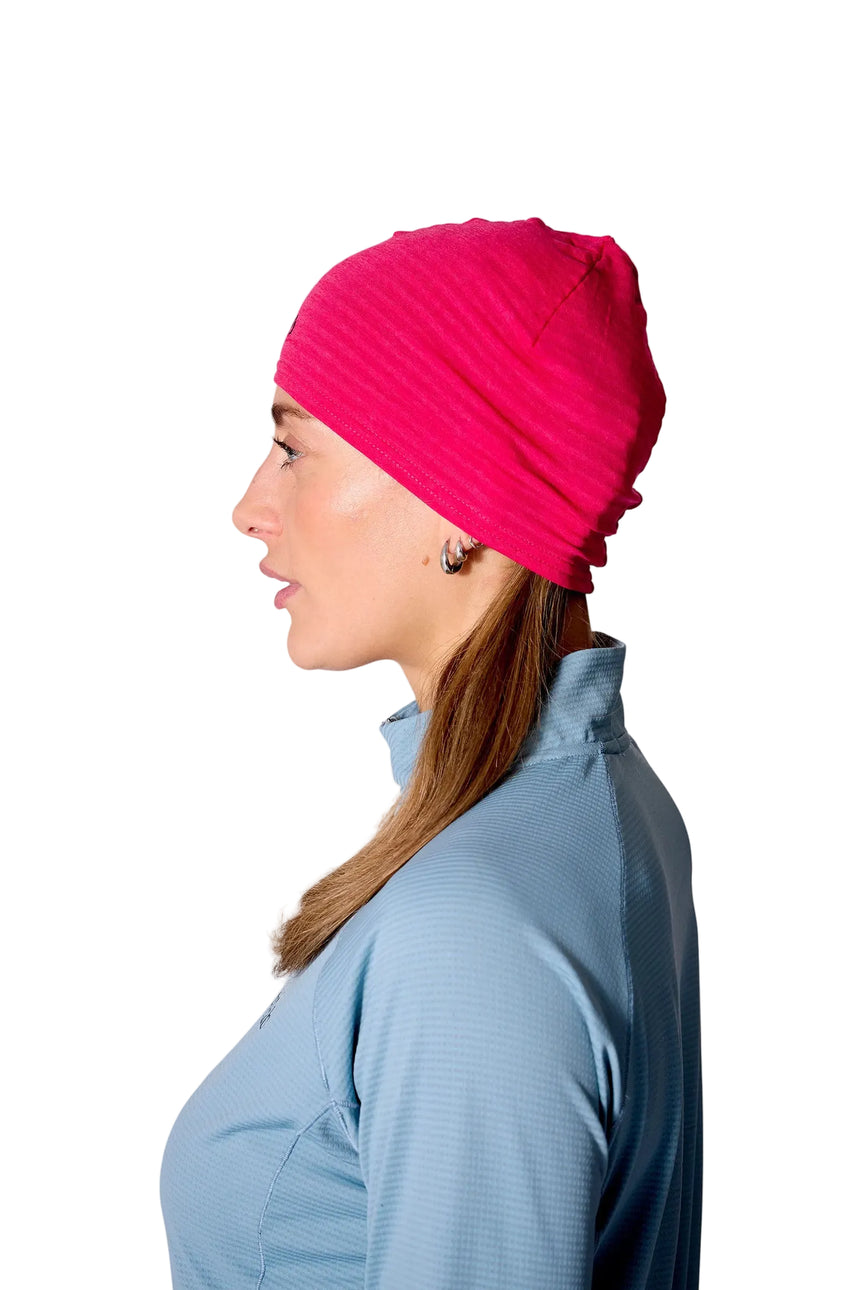 Rab Filament Beanie worn by woman, side view, styling reference
