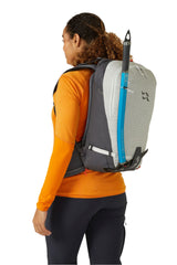 Rab Khroma 22L Ski Pack in Pewter - On Model Side View with Ski Carry