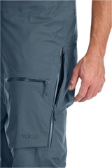 Rab Men's Khroma Kinetic Waterproof Bib Pants in Orion Blue - thigh pocket detail, alternate view