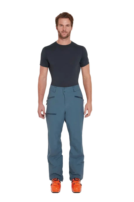 Rab Men's Khroma Kinetic Waterproof Ski Pants in Orion Blue - worn, front