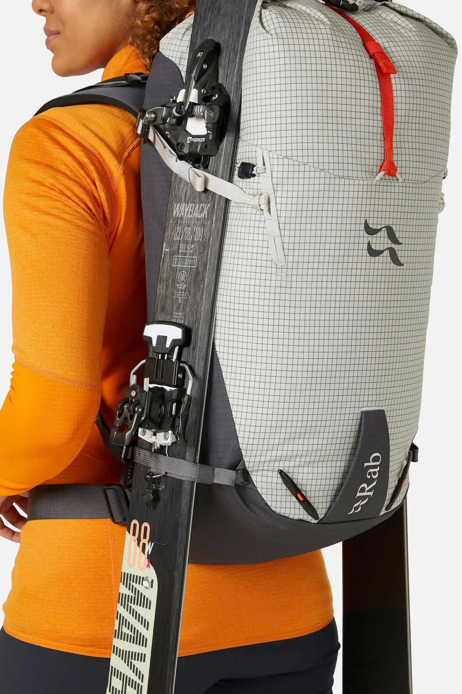 Rab Latok 28L Mountain Pack in Pewter - Model Side View Gear Attachment Detail