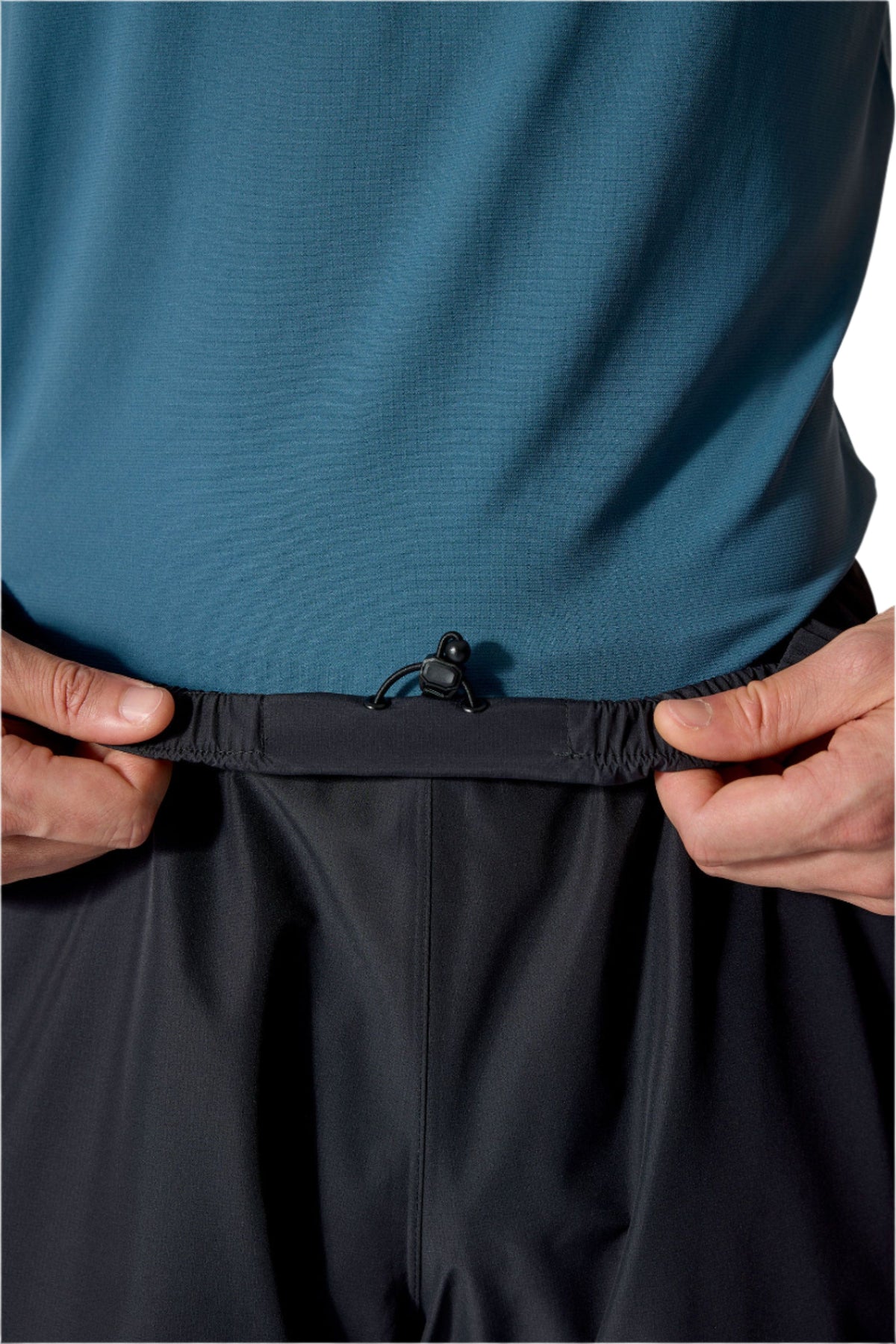 Rab Men's Downpour Waterproof Pants in Black - side zip detail, worn