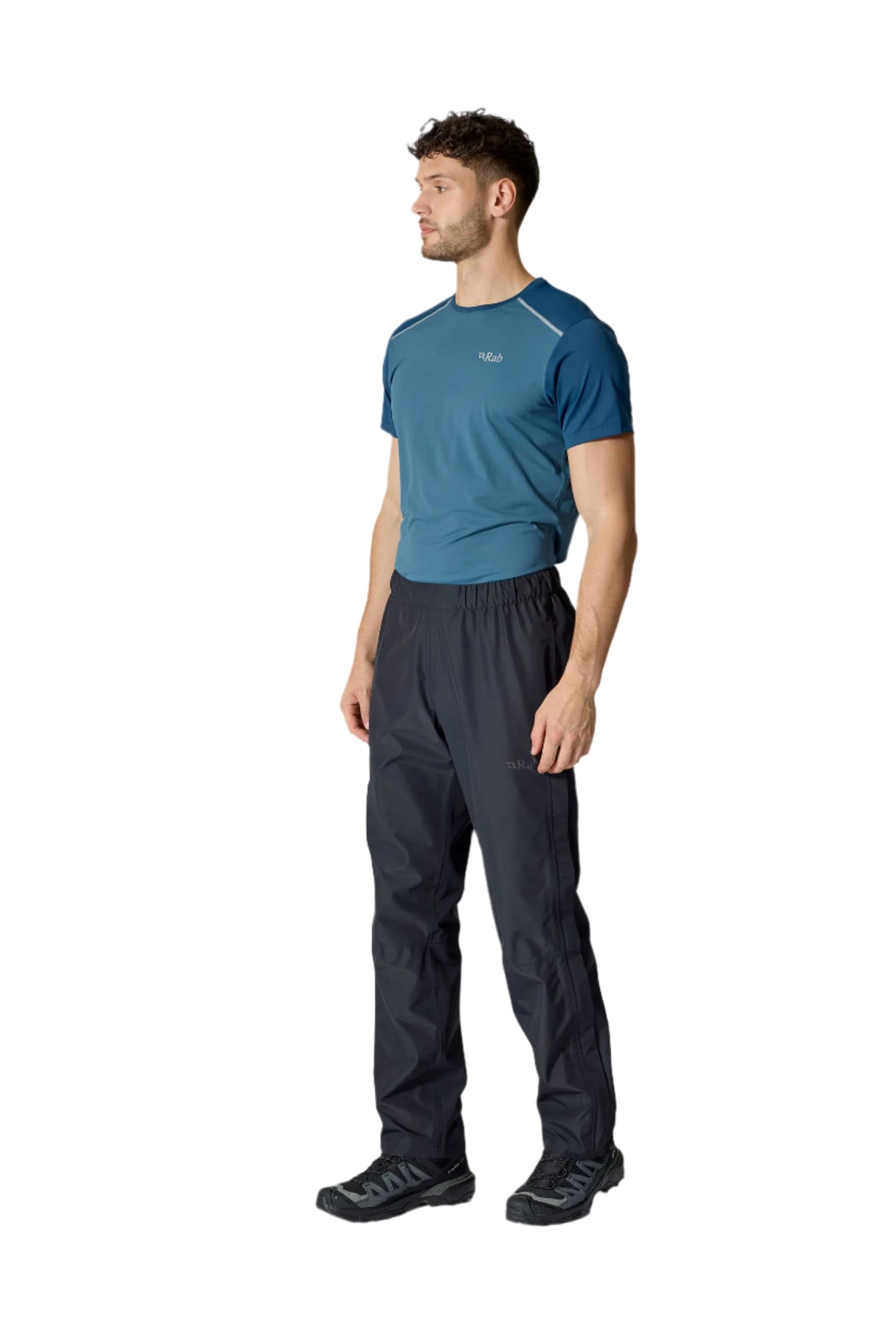 Rab Men's Downpour Waterproof Pants in Black - side zip detail, lower leg, worn