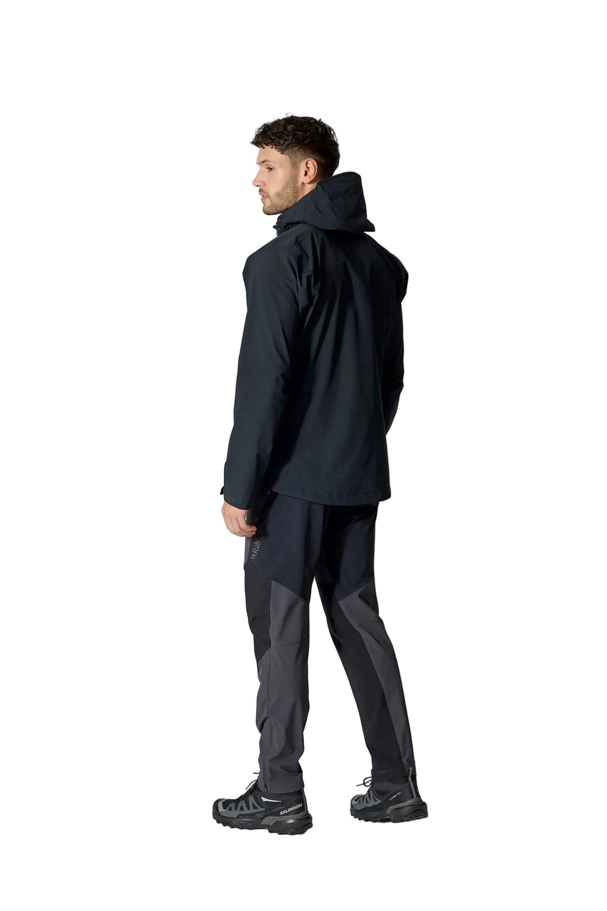 Rab Men's Firewall Waterproof Jacket in Black - worn, three-quarter