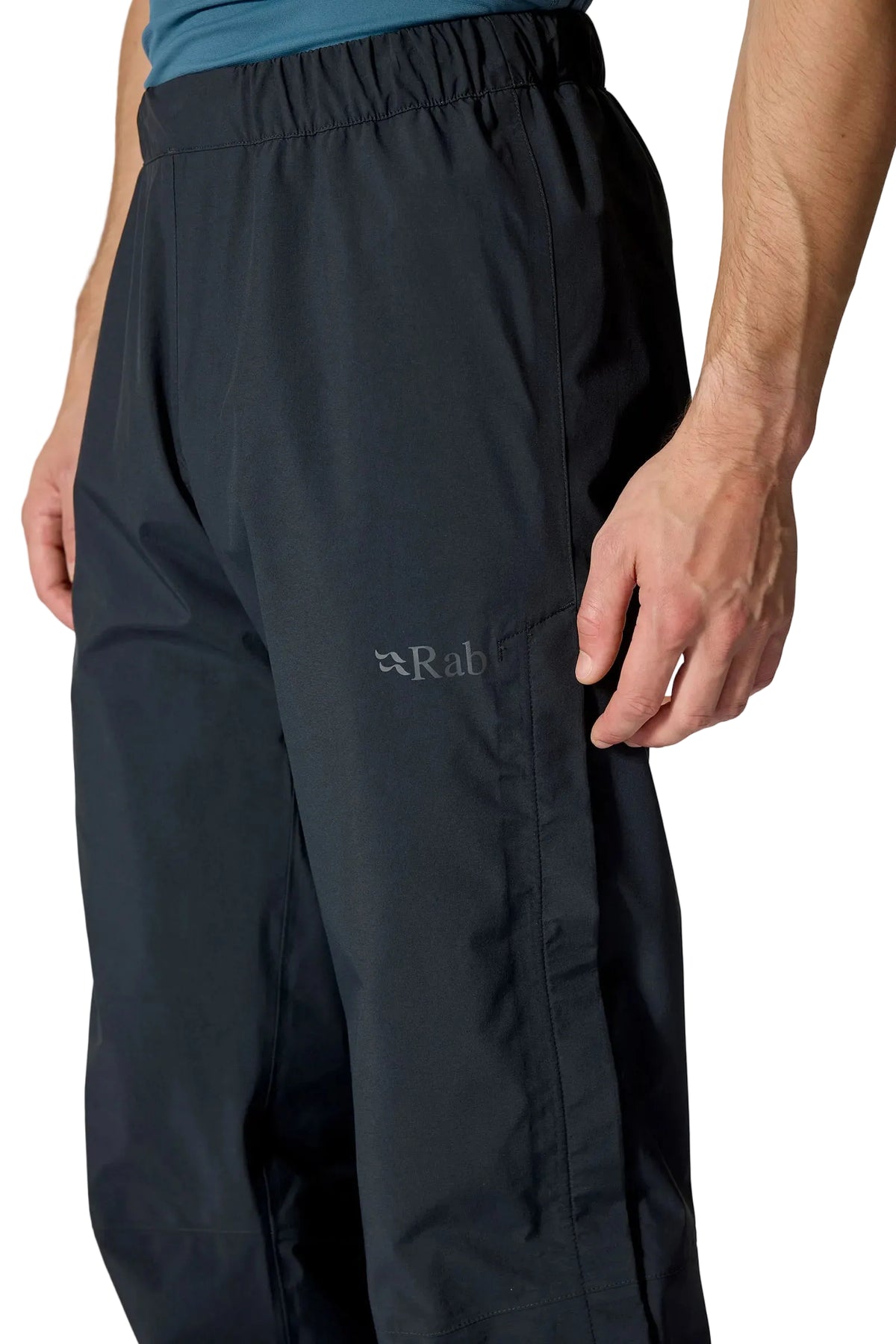 Rab Men's Firewall Waterproof Pants in Black - side detail, worn