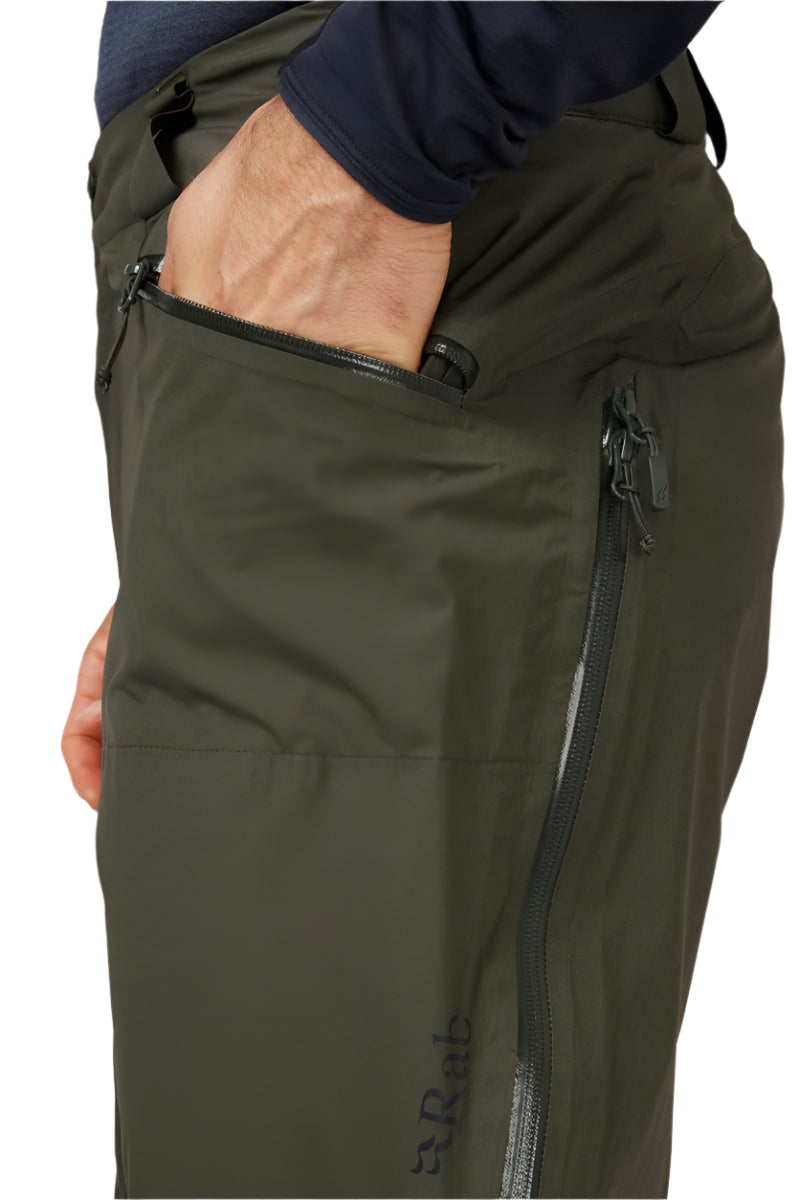 Rab Men's Khroma Diffract Insulated Ski Pants in Army - side, worn
