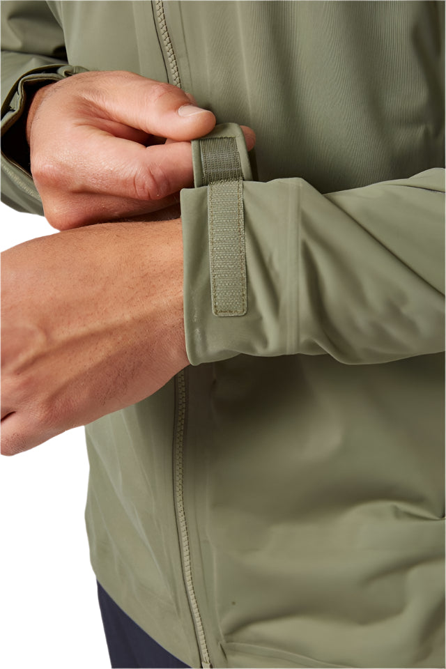 Rab Men's Kinetic 2.0 Waterproof Jacket in Green (styling reference) - cuff detail, worn