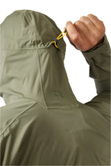 Rab Men's Kinetic 2.0 Waterproof Jacket in Green (styling reference) - hood drawcord detail, worn