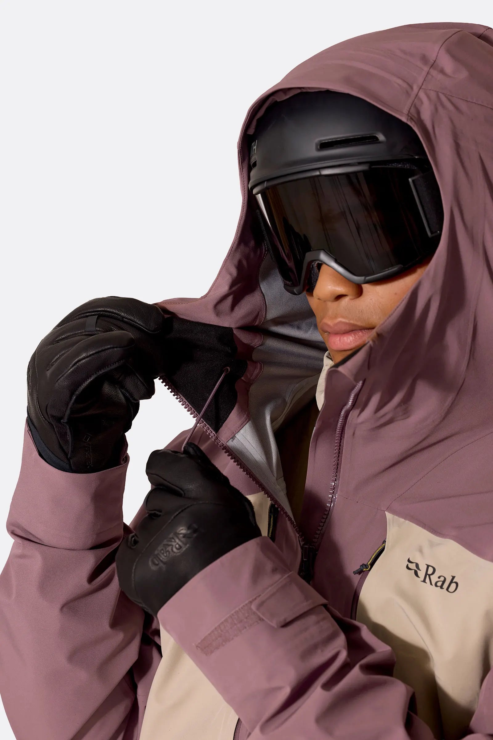 Rab Men’s Kinetic Alpine Stretch Jacket - adjusting goggles, worn