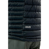 Rab Men's Microlight Alpine Down Jacket in Black - worn, hem label detail