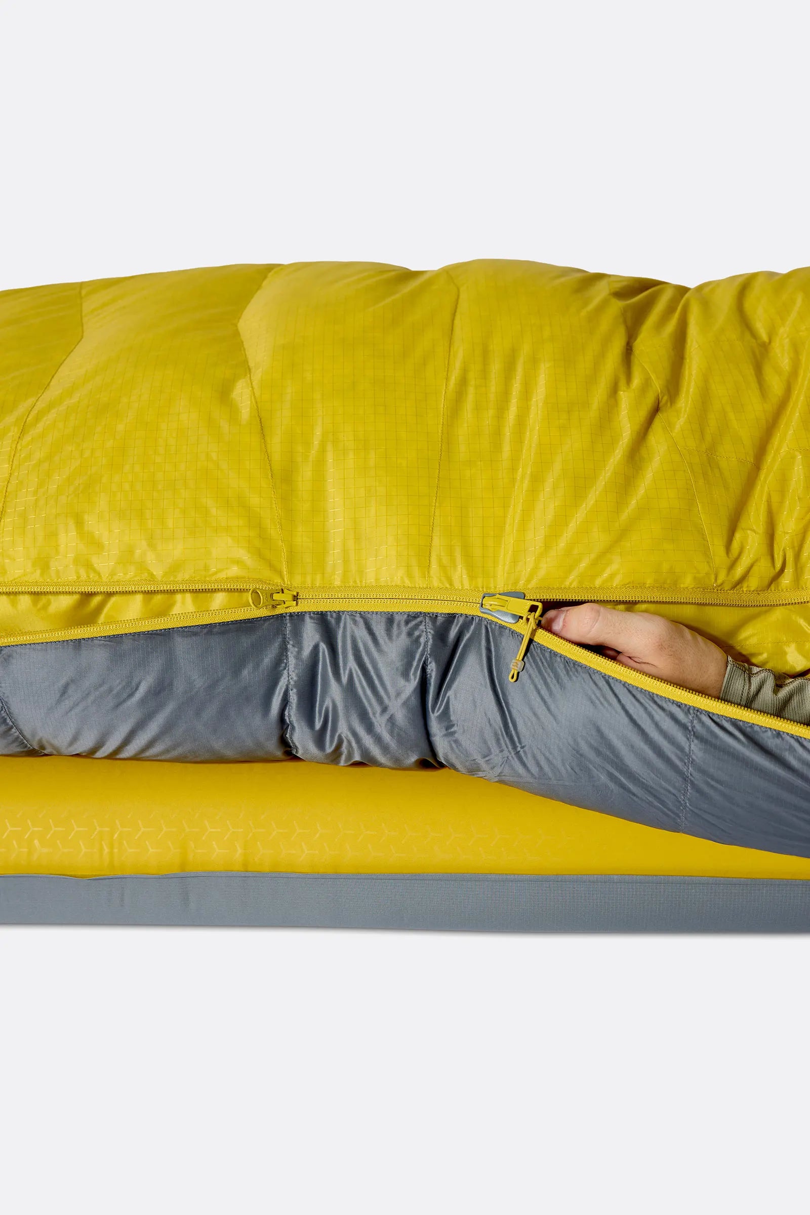 Rab Neutrino Down Sleeping Bag (-18°C/0F) in Graphene/Dark Pollen - Model Lying Left