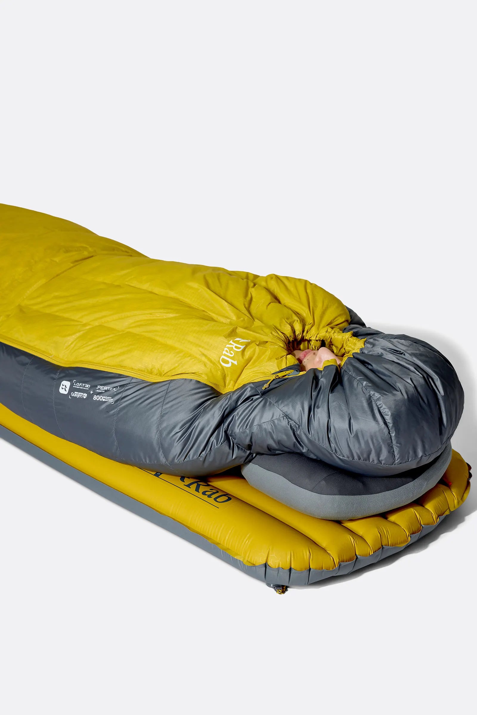 Rab Neutrino Down Sleeping Bag (-18°C/0F) in Graphene/Dark Pollen - Model Lying Side