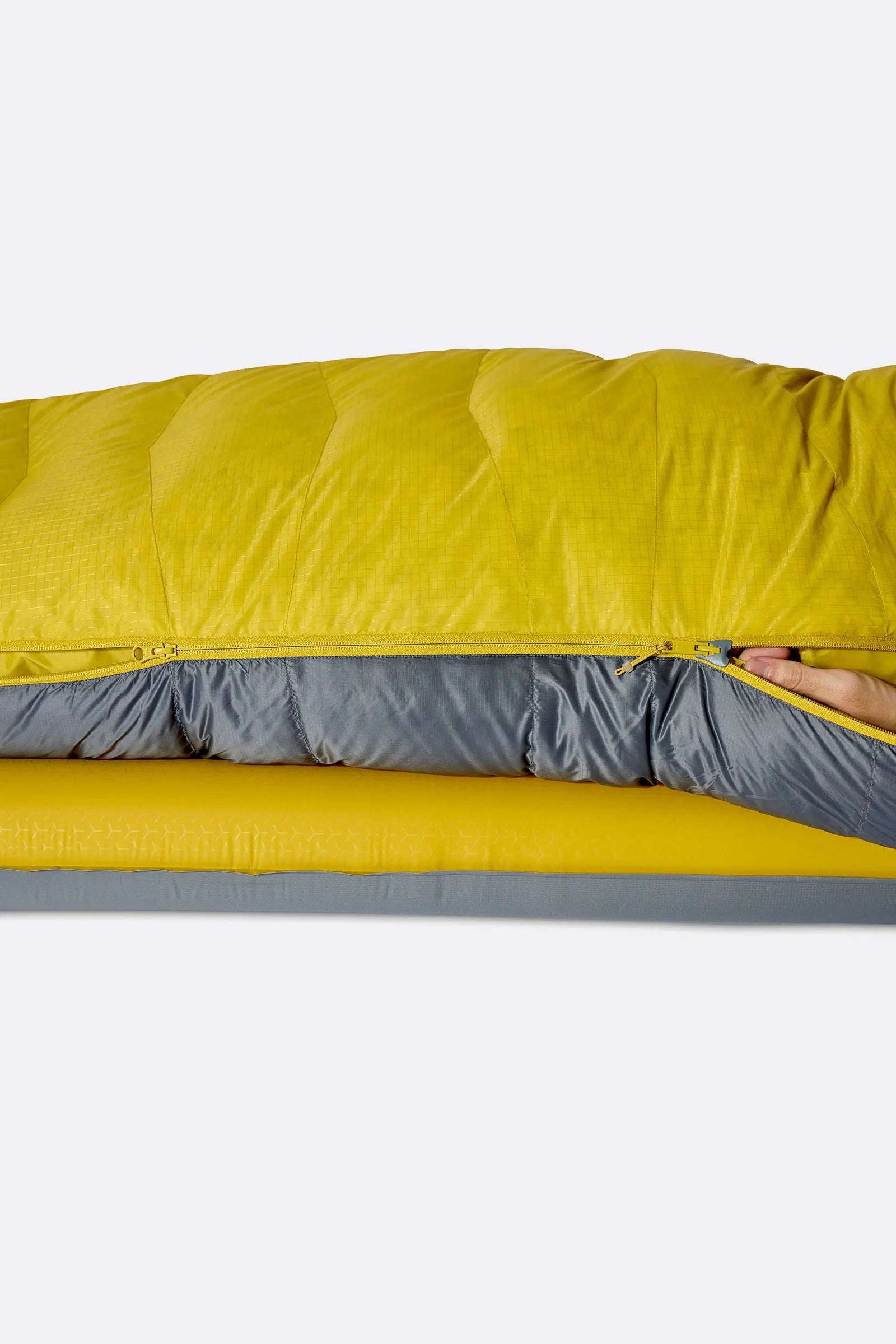 Rab Neutrino Down Sleeping Bag (-6°C/20F) in Graphene/Dark Pollen - Model Side Sleeping Position