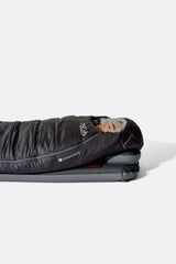 Rab Radeon Synthetic Sleeping Bag (-12°C/10F) in Sage/Graphene - worn, side sleeping close-up