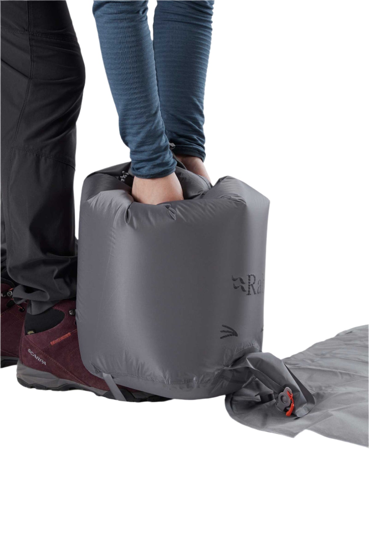 Rab Stratosphere 5.5 Sleep Pad in Graphene - pump sack, in use