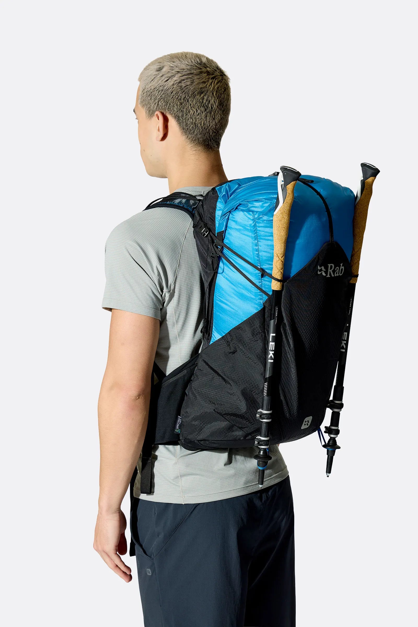 Rab Syclon XP 30L Waterproof Pack in Black/Maya Blue - Back View On Model 4