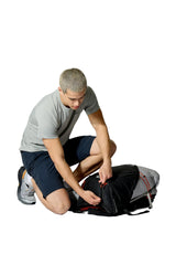 Rab Syclon XP 40L Waterproof Pack in Black/Dark Pewter - Seated View On Model 2