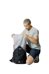 Rab Syclon XP 40L Waterproof Pack in Black/Dark Pewter - Seated View On Model 3