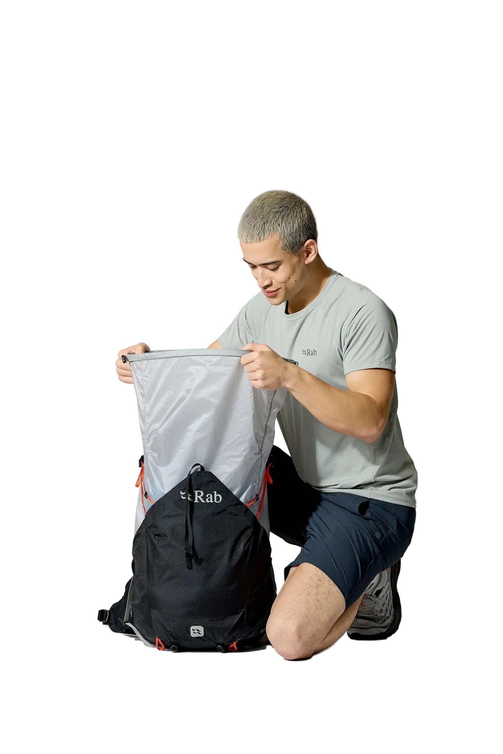 Rab Syclon XP 40L Waterproof Pack in Black/Dark Pewter - Seated View On Model 3