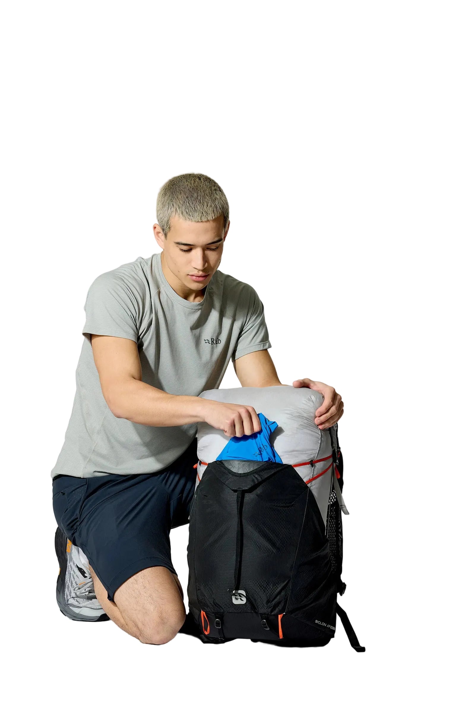 Rab Syclon XP 40L Waterproof Pack in Black/Dark Pewter - Seated View On Model