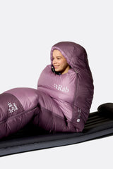 Rab Women's Alpine Down Sleeping Bag (-18°C/0F) in Iris/Dark Iris - worn, sitting up