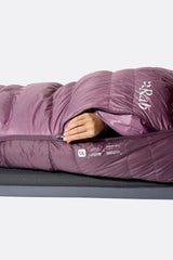 Rab Women's Alpine Down Sleeping Bag (-18°C/0F) in Iris/Dark Iris - worn, reaching