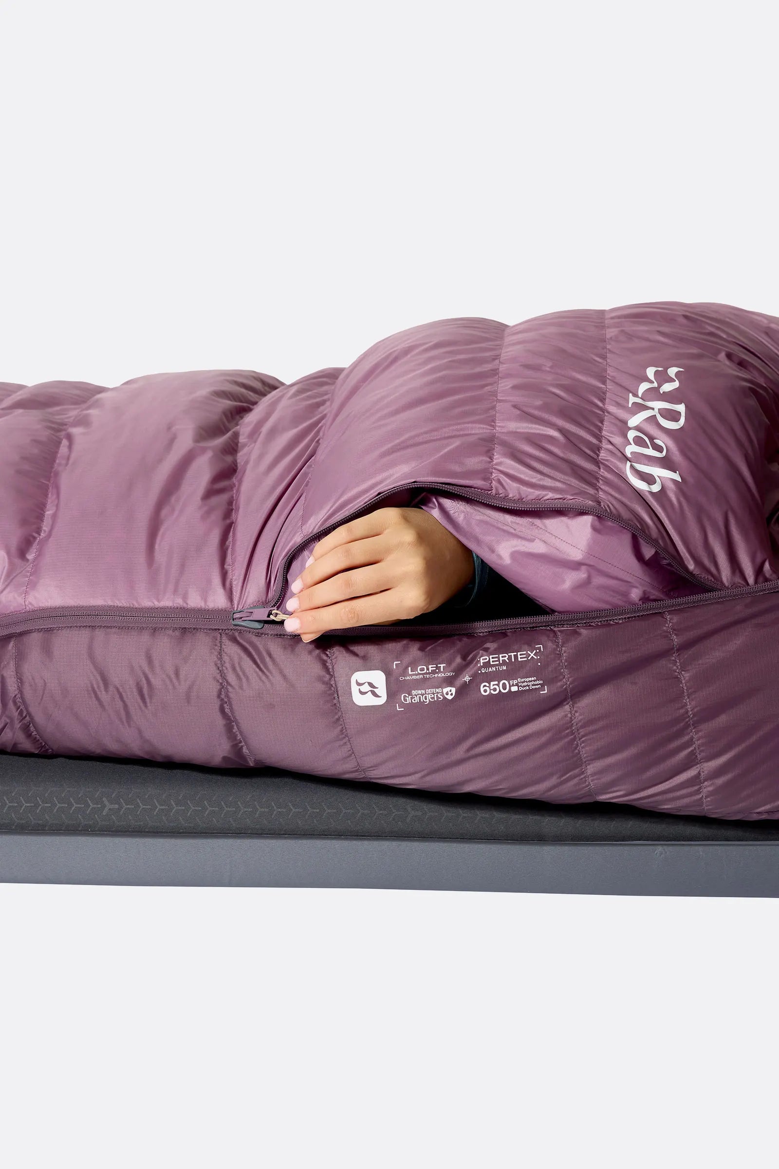 Rab Women's Alpine Down Sleeping Bag (-18°C/0F) in Iris/Dark Iris - worn, reaching