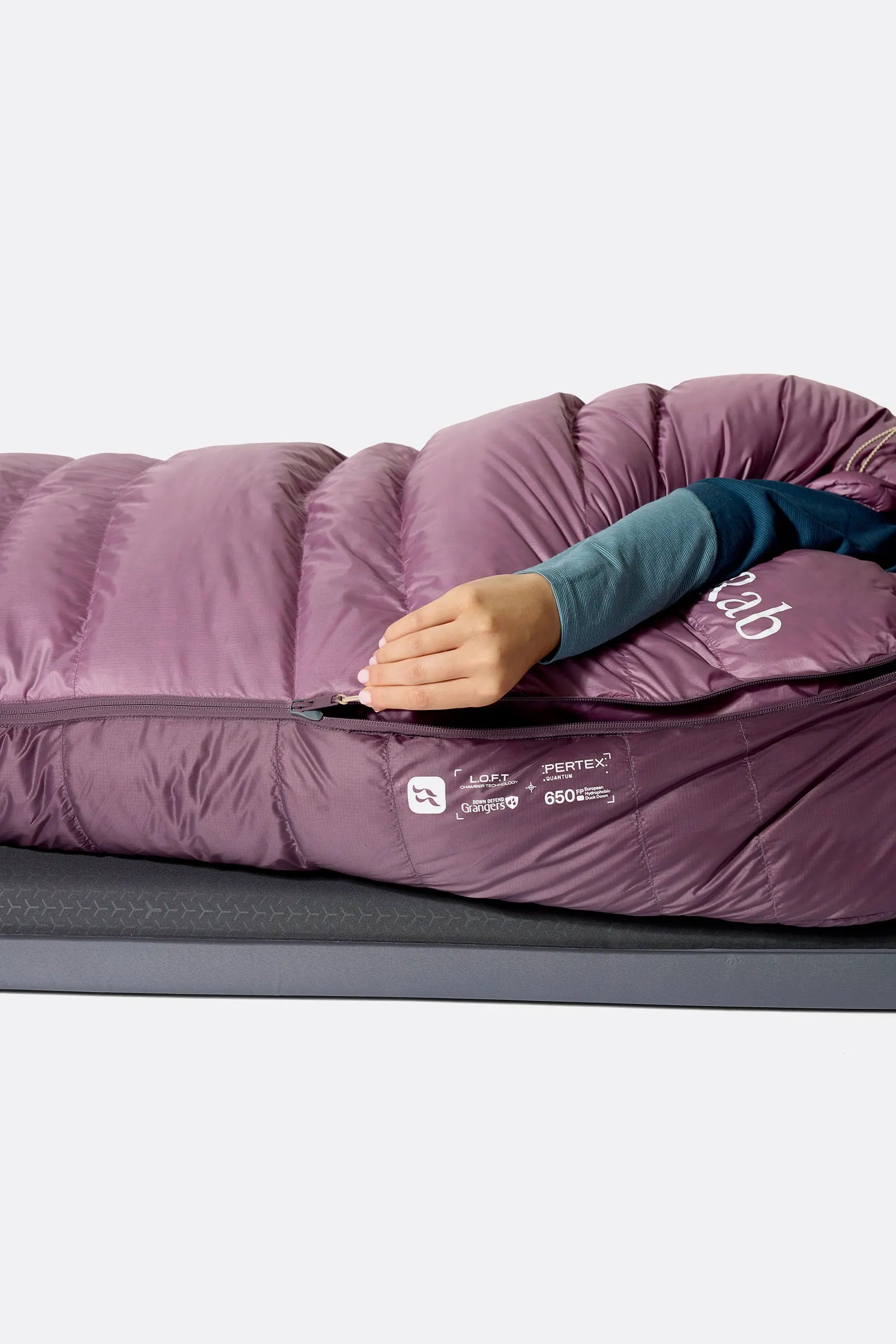 Rab Women's Alpine Down Sleeping Bag (-18°C/0F) in Iris/Dark Iris - worn, side sleeping