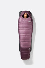 Rab Women's Alpine Down Sleeping Bag (-6°C/21F) in Iris/Dark Iris - Model Seated Close