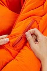 Rab Women's Andes Infinium 800 Down Sleeping Bag in Atomic - zip pull detail, worn