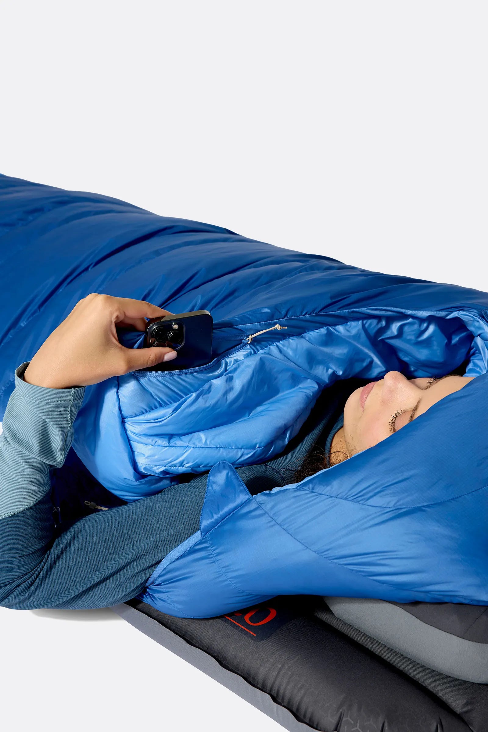Rab Women's Ascent Down Sleeping Bag (-6°C/20F) in Dark Bluebird/Bluebird - Model Arm Out 2