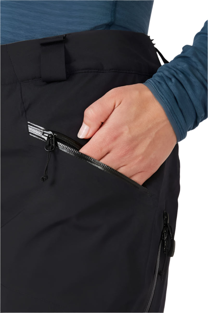 Rab Women's Khroma Diffract Insulated Ski Pants in Black - front, worn