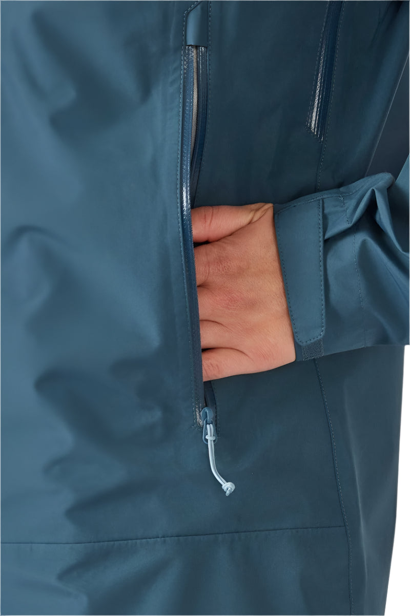 Rab Women's Namche GORE-TEX Jacket in Orion Blue - hand pocket detail, worn