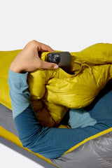 Rab Women's Neutrino Down Sleeping Bag (-6°C/20F) in Zinc/Dark Pollen - Model In Use Side