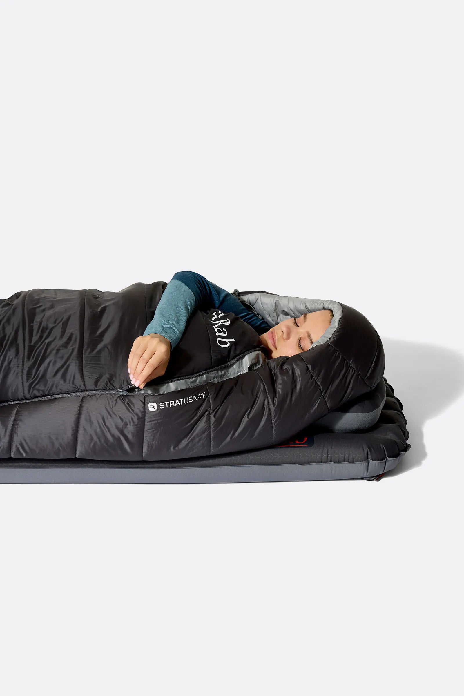 Rab Women's Radeon Synthetic Sleeping Bag (-12°C/10F) in Dark Fig Green/Graphene - worn, side sleeping close-up