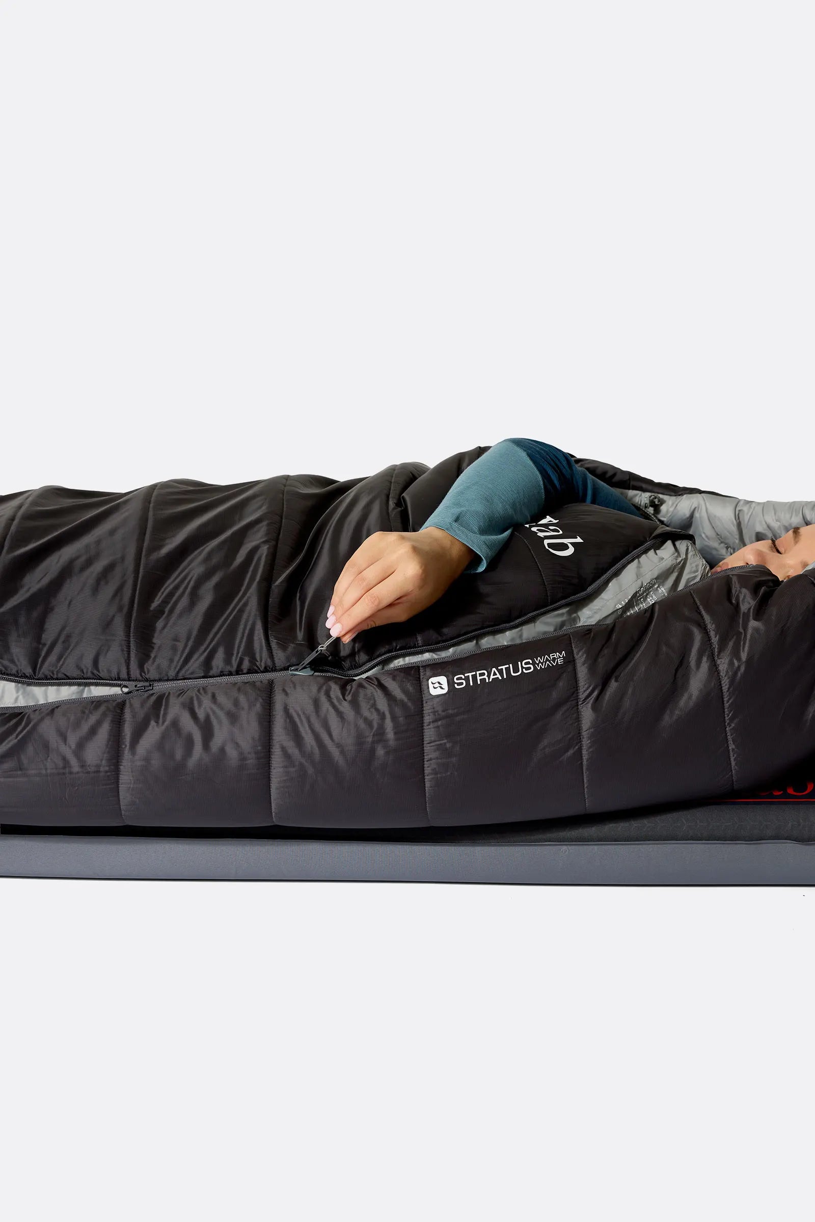 Rab Women's Radeon Synthetic Sleeping Bag (-12°C/10F) in Dark Fig Green/Graphene - worn, side sleeping