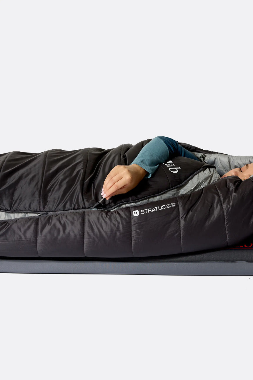 Rab Women's Radeon Synthetic Sleeping Bag (-12°C/10F) in Dark Fig Green/Graphene - worn, side sleeping