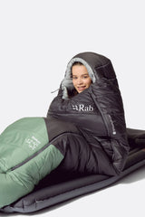 Rab Women's Radeon Synthetic Sleeping Bag (-12°C/10F) in Dark Fig Green/Graphene - worn, sitting up