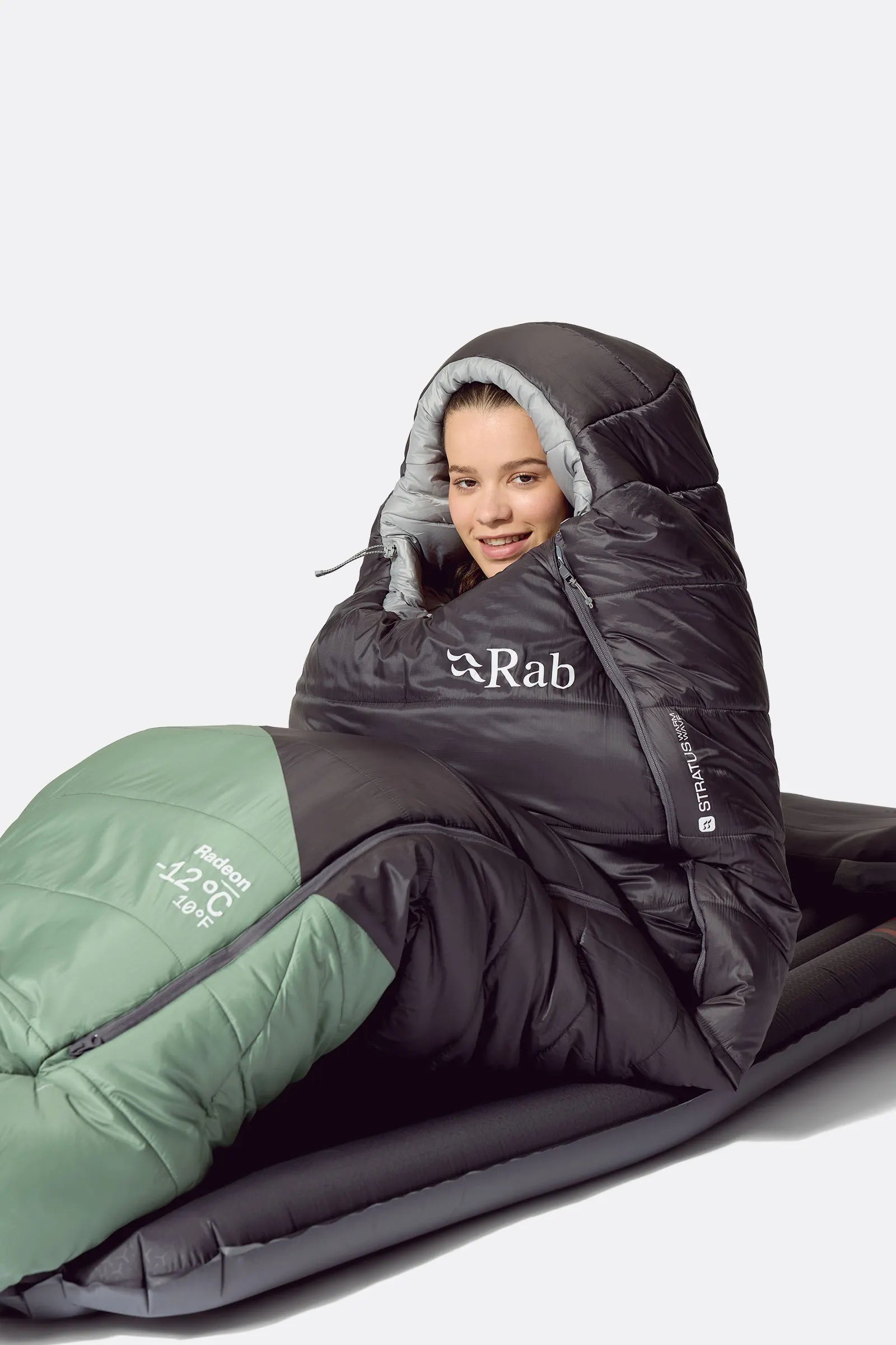 Rab Women's Radeon Synthetic Sleeping Bag (-12°C/10F) in Dark Fig Green/Graphene - worn, sitting up