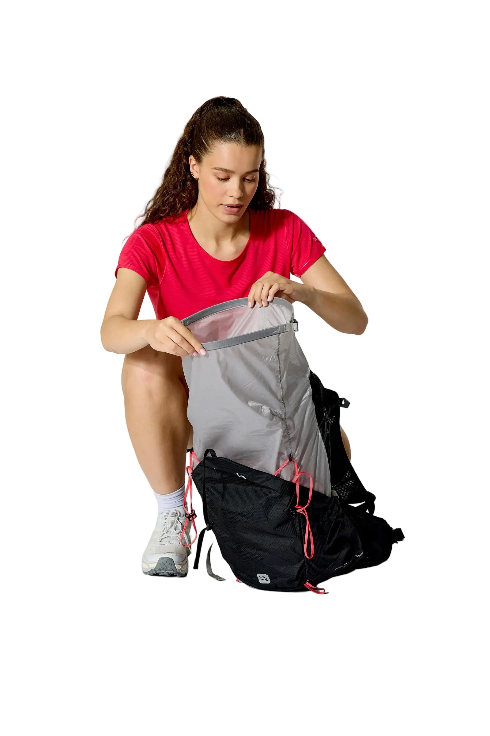 Rab Women's Syclon XP ND 28L Waterproof Pack in Black/Dark Pewter - Seated View On Model