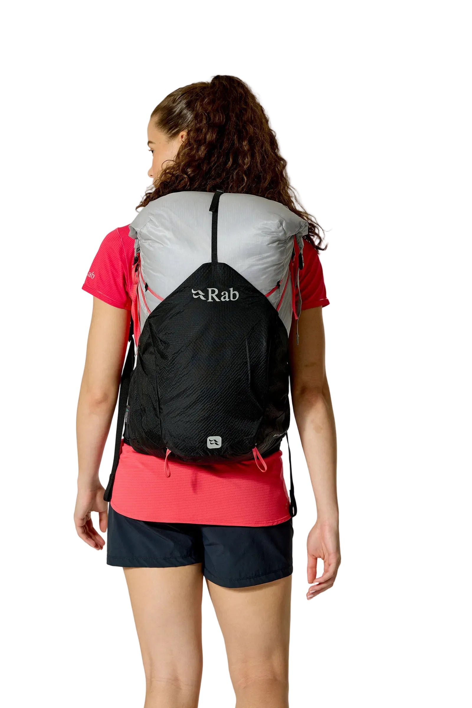Rab Women's Syclon XP ND 28L Waterproof Pack in Black/Dark Pewter - Three Quarter View On Model 4