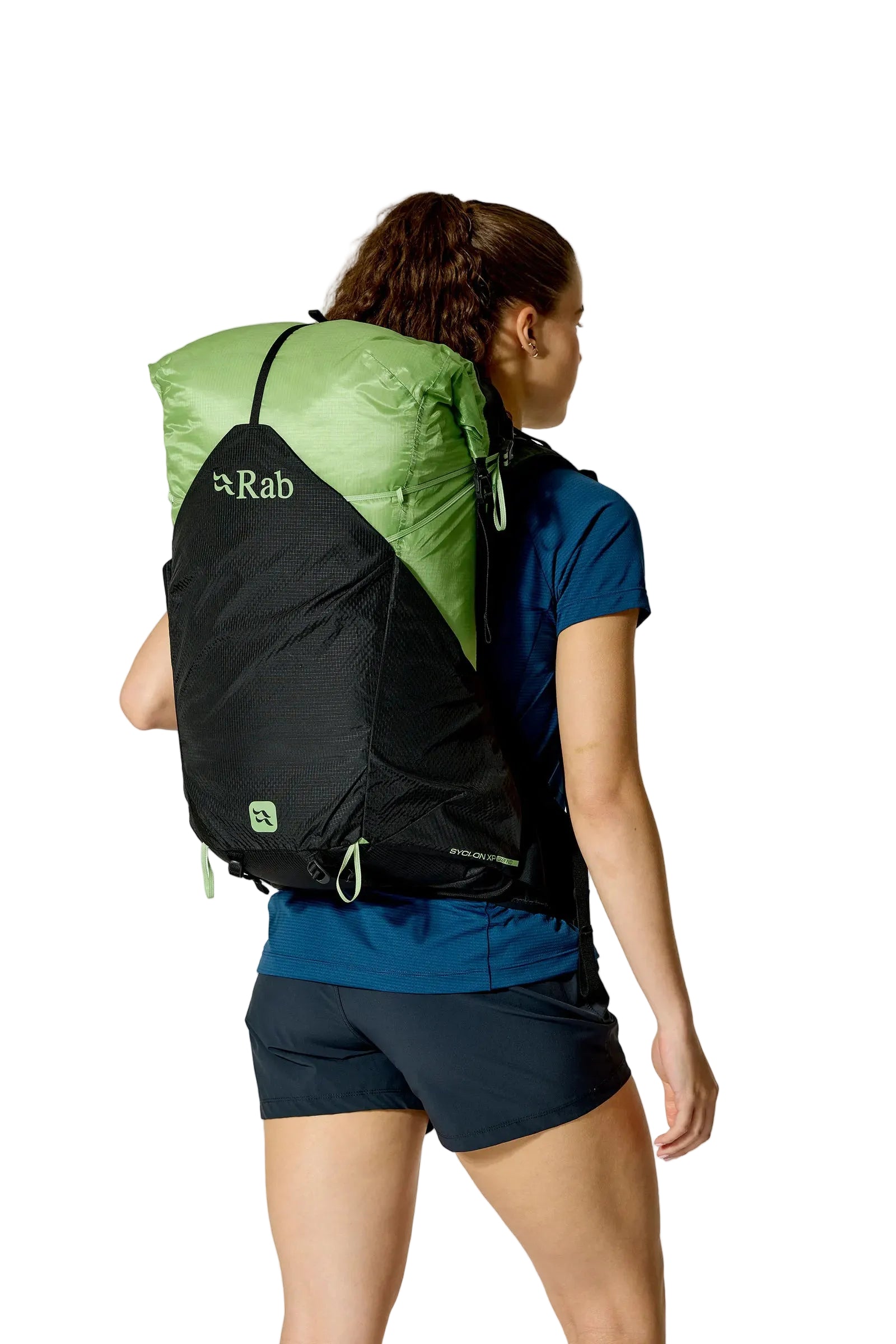 Rab Women's Syclon XP ND 38L Waterproof Pack in Black/Dark Fig Green - Back View On Model 3