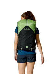 Rab Women's Syclon XP ND 38L Waterproof Pack in Black/Dark Fig Green - Back View On Model 4