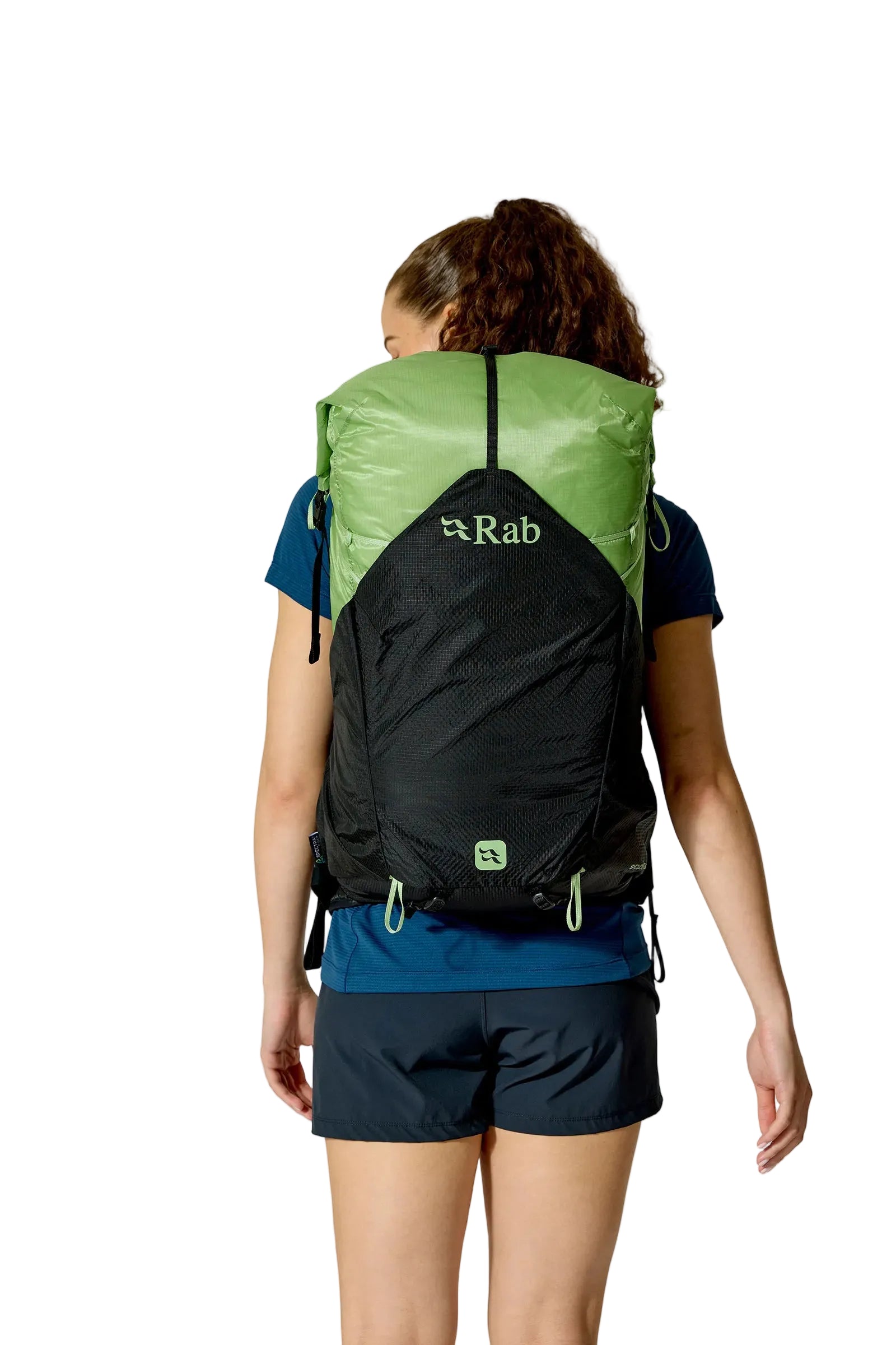 Rab Women's Syclon XP ND 38L Waterproof Pack in Black/Dark Fig Green - Back View On Model 4