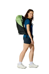 Rab Women's Syclon XP ND 38L Waterproof Pack in Black/Dark Fig Green - Three Quarter View On Model 3