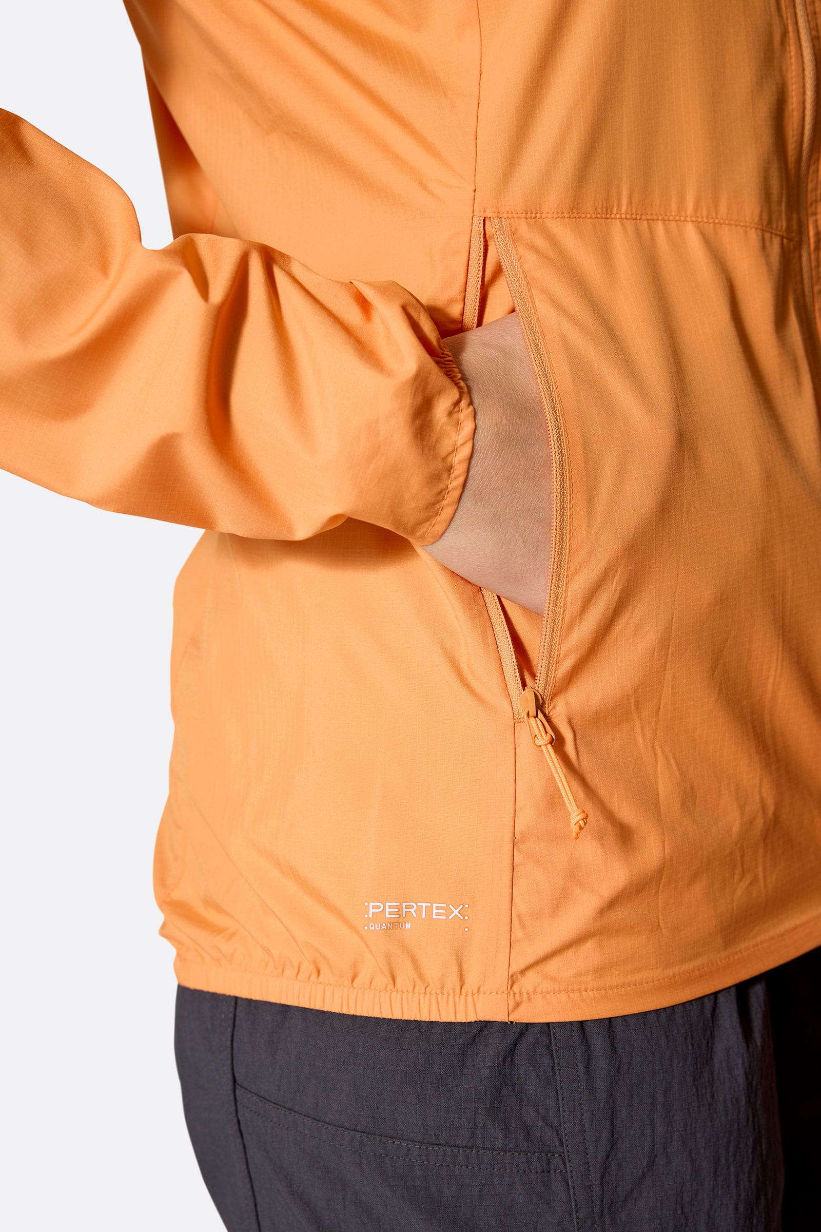 Rab Women's Windgather Hooded Jacket in Orange - pocket detail worn